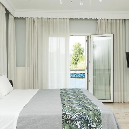 Glykanisos Suites เนอาเปรามอส ภายนอก รูปภาพ