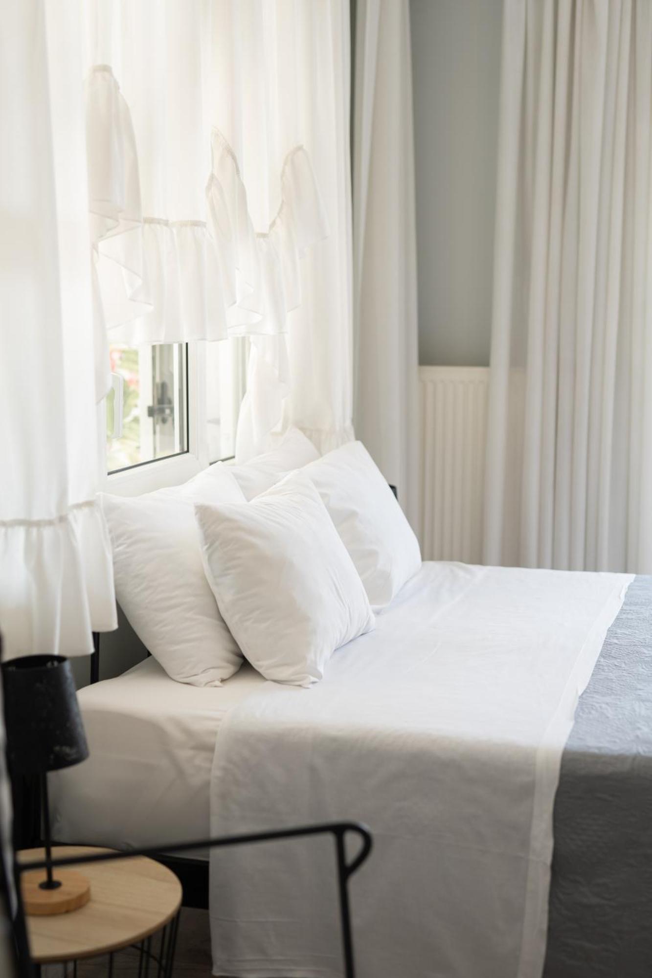Glykanisos Suites เนอาเปรามอส ภายนอก รูปภาพ