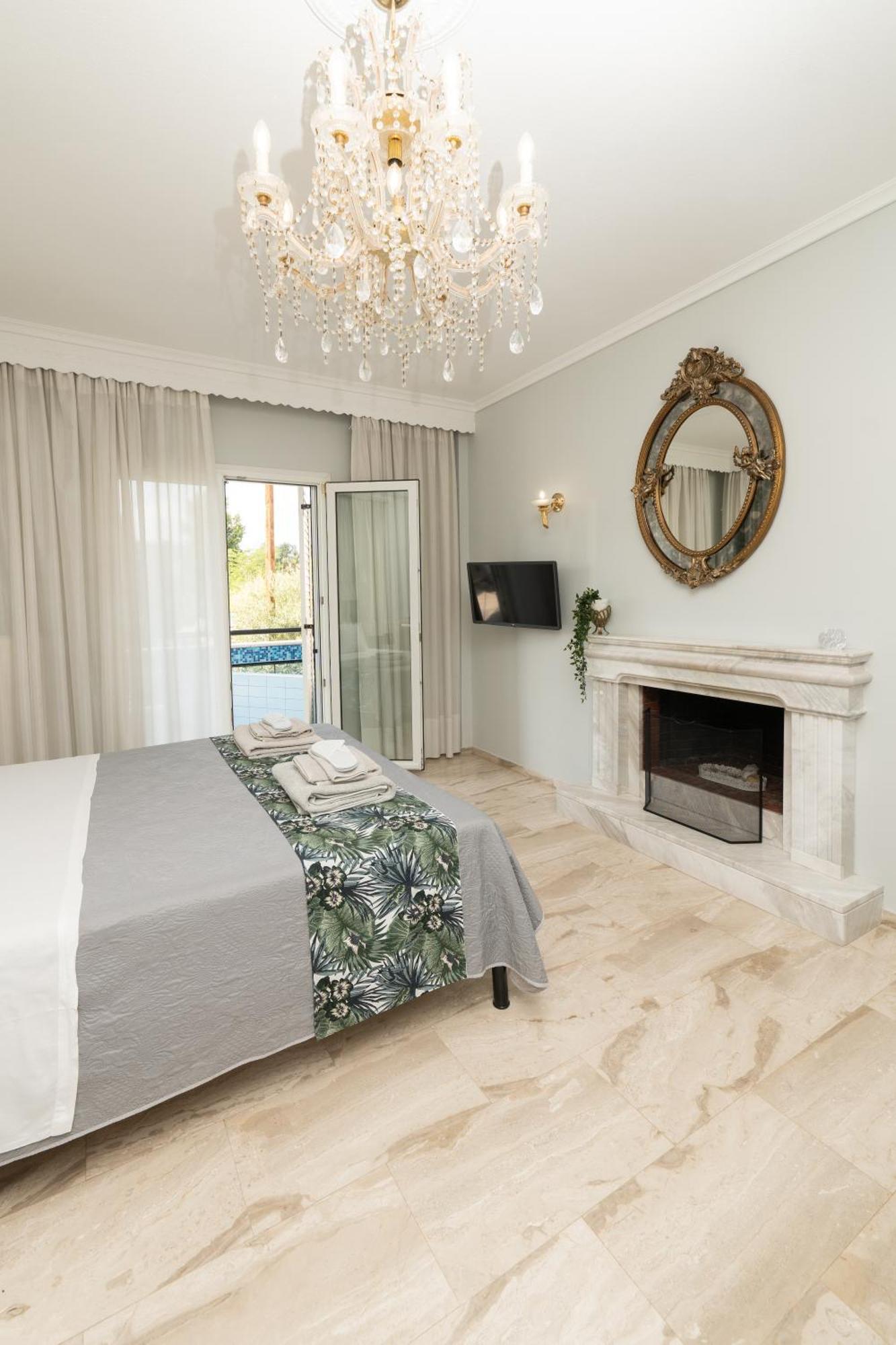 Glykanisos Suites เนอาเปรามอส ภายนอก รูปภาพ