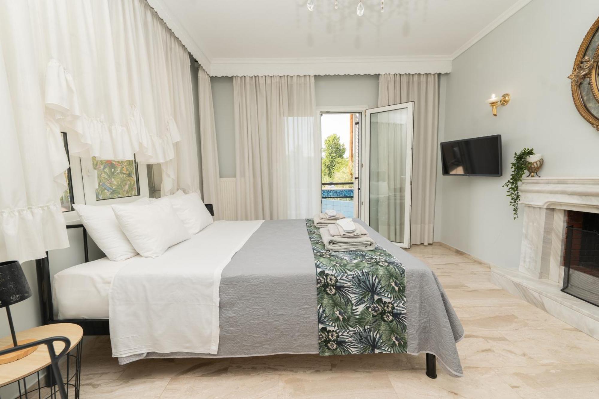 Glykanisos Suites เนอาเปรามอส ภายนอก รูปภาพ
